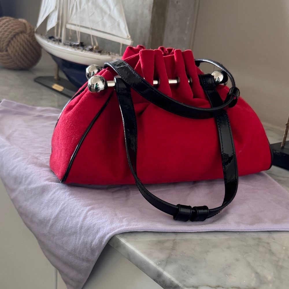Elegant Red suede Lulu Guinness  Women's Bag with silver Accents.
